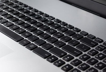 keyboard from the laptop.laptop in open view and its keyboard close up