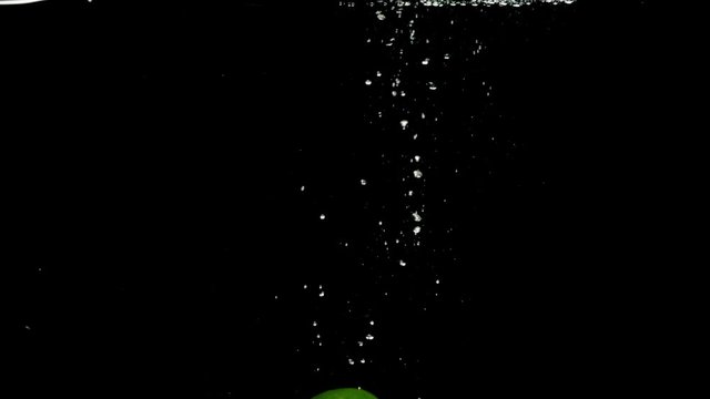 lime drop in water slower motion