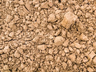 Freshly plowed agricultural field background