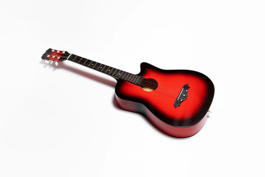 Classic acoustic guitar isolated on white background with clipping path. High-resolution photo.