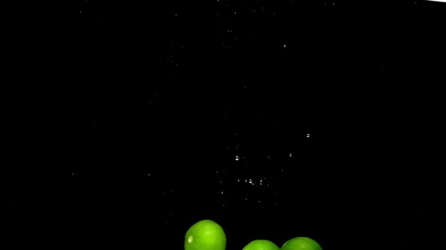 lime drop in water slower motion