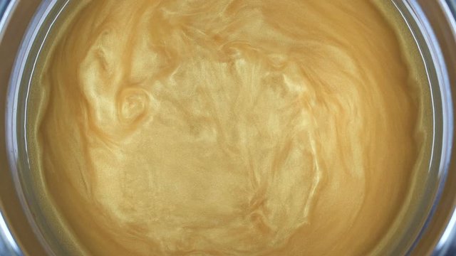 Rheoscopic fluid. Beautiful movement of particles in a liquid. Fantastic patterns and shapes. 50 fps