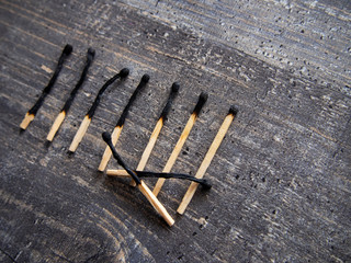 dead matches on the wooden table