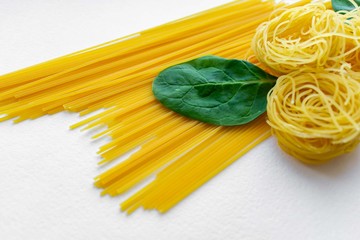 italian pasta tagliatelle with basil