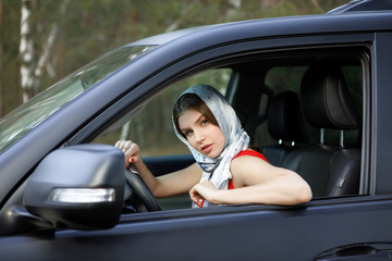 Young woman in a car