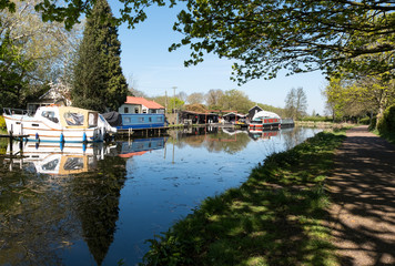 Fototapeta na wymiar Tranquil canal background scene on the Erewash Canal in Long Eaton, Derbyshire