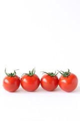 Mini panicle tomatoes on white background