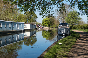 Peaceful summer scene with canal boats