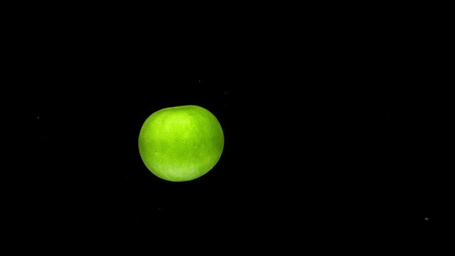 lime drop in water slower motion