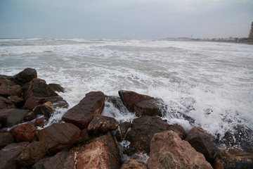 Fototapeta na wymiar The sea from the jetty on a stormy day