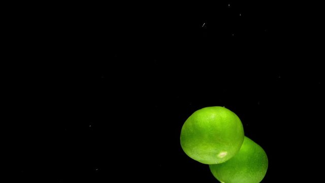 lime drop in water slower motion
