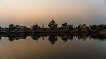 Heritage Kusum Sarovar, a historical sandstone monument on the holy Govardhan Hill between...