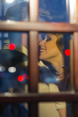 Close-up portrait of a young girl who hugs her man and laughs . In retro suits. Historical...