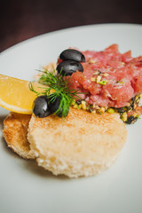 salmon tartar steak with toast