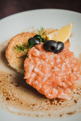 salmon tartar steak with toast