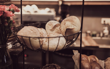 fresh baked goods in the window of a bakery or store