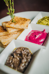 toast with horseradish, garlic butter and aubergine paste