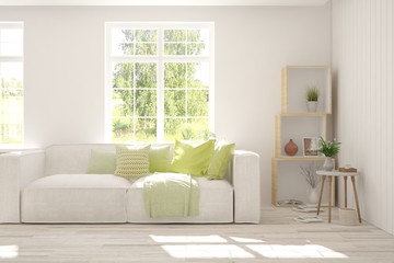 White living room with sofa and summer landscape in window. Scandinavian interior design. 3D illustration