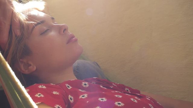 passionate sexual massage of the head in the sun-drenched frame. stay at home. classes during the lockdown. covid-19 coronavirus