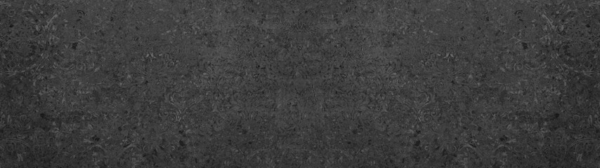 Old black anthracite vintage shabby patchwork motif tiles stone concrete cement wall texture...