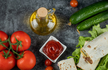 Arabic street food shaurma in lavash with tomato and cucumber