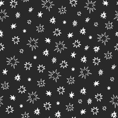 Seamless pattern with white stars on chalkboard