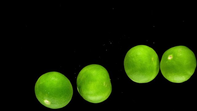 lime drop in water slower motion