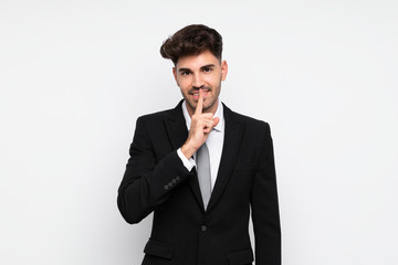 Young businessman over isolated white background doing silence gesture