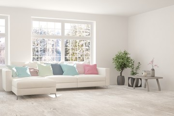 White living room with sofa and winter landscape in window. Scandinavian interior design. 3D illustration