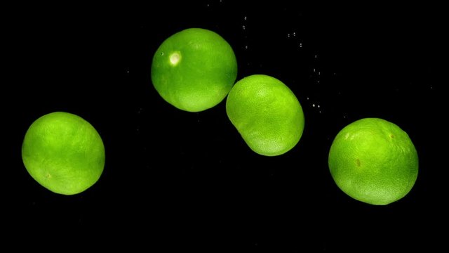 lime drop in water slower motion