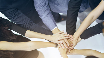 People putting hands together,Unity and teamwork concept