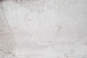 Cement grey background. Grey cement wall during the construction of a house.
