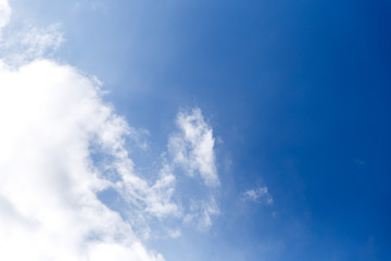 Blue sky background with clouds.