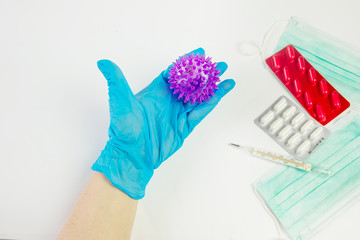 Hands in sterile gloves with syringe with vaccine from virus on white background. Science, health care, pandemic, epidemia concept