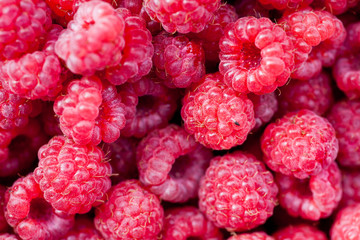 background of bright red raspberries