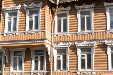 A large wooden house. Old wooden architecture. The center of a small town.