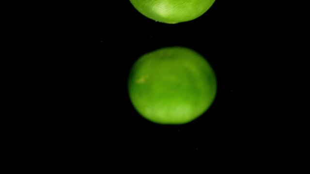 lime drop in water slower motion
