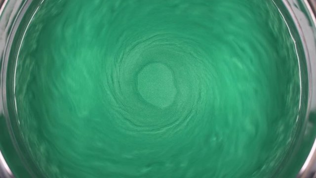 Rheoscopic fluid. Beautiful movement of particles in a liquid. Fantastic patterns and shapes. 50 fps
