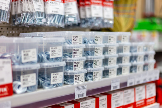 in a large hardware store, a department of screws and nails in a display case Belarus, Minsk, April 11, 2020.