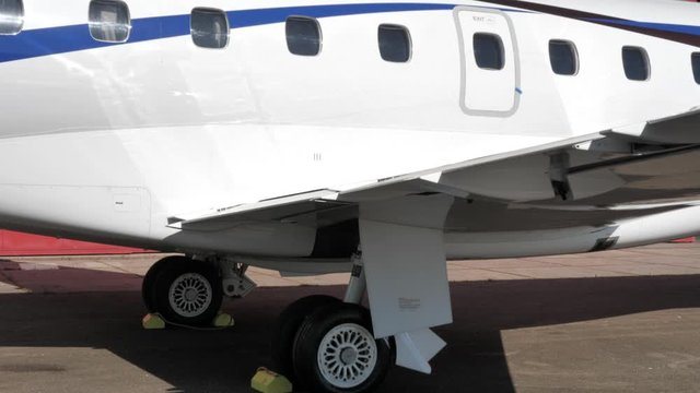 Close up extending flaps on aircraft wing, aerodynamic lift surface.