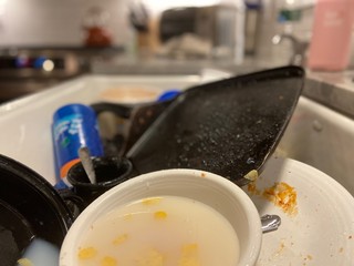 A sink full of dirt dishes