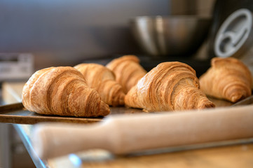 Fresh croissants removed from the oven