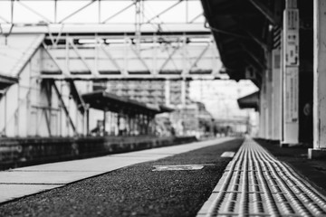 Fototapeta na wymiar Floor from track in Metro Station, Hiroshima, Japan (in black and white)