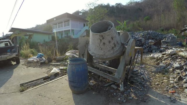 Manual Cement Mixer Machine at Rural Small Scale Construction Site in Thailand