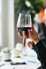 Business people enjoying wine