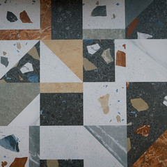 tiles with stoun and geometric pattern, square shape