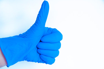 blue glove, hand in glove on a white background.