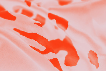 Abstract light orange watercolor background with lush lava color spots