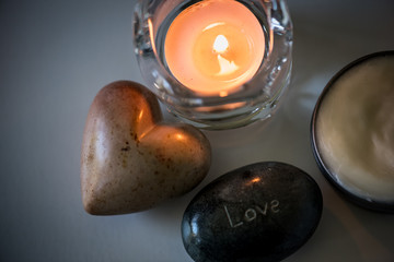Fototapeta na wymiar candle and rocks for self care