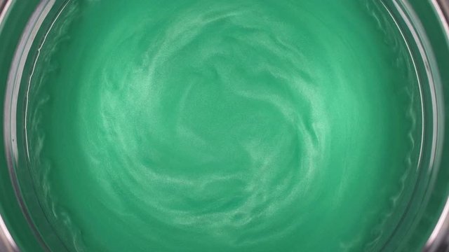 Rheoscopic fluid. Beautiful movement of particles in a liquid. Fantastic patterns and shapes. 50 fps